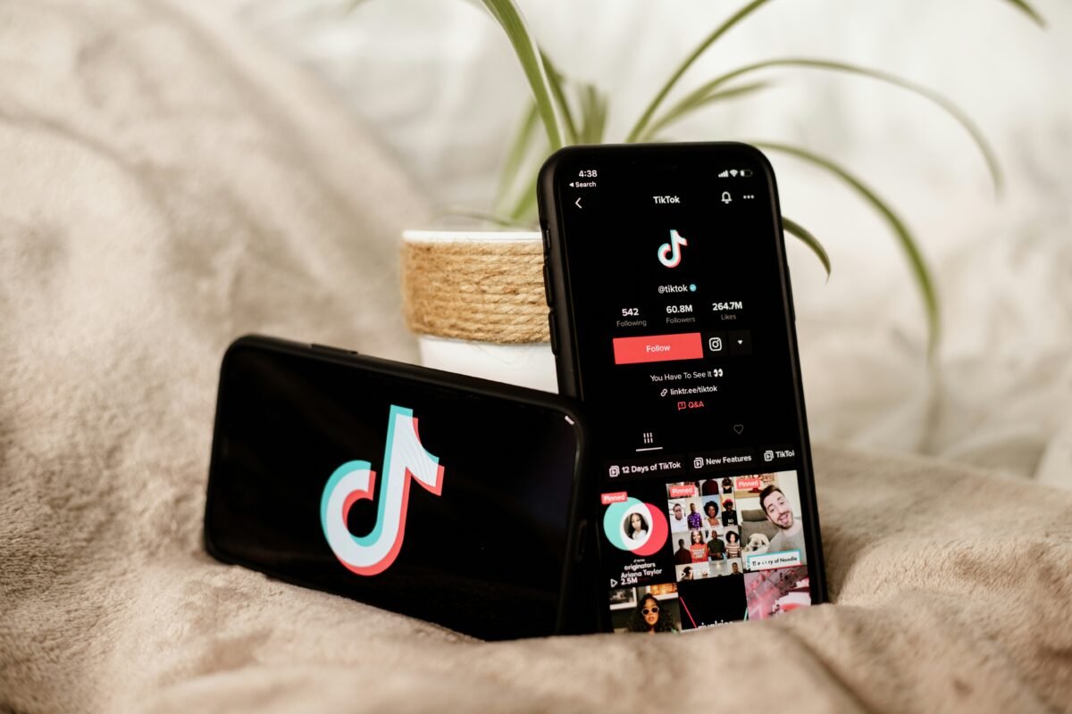 TikTok app open on a smartphone showing short-form video content feed for social commerce