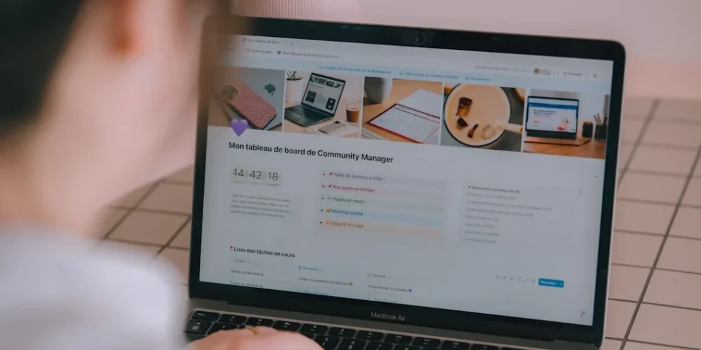 Person looking at a laptop screen with website